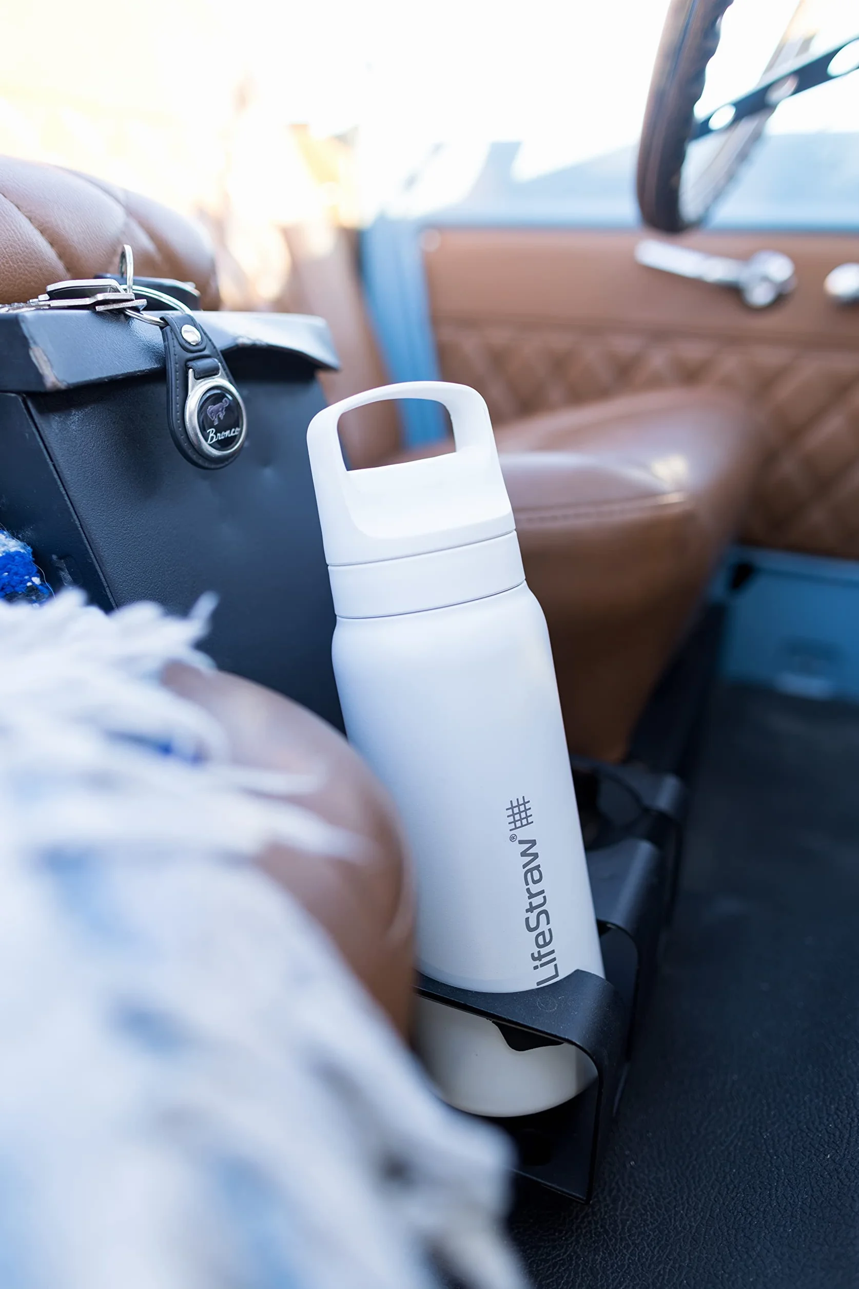 LifeStraw Seria Go – izolowana butelka z filtrem wody ze stali nierdzewnej do podróży i codziennego użytku, usuwa bakterie, pasożyty i mikroplastiki, poprawia smak, 680 ml Polar White