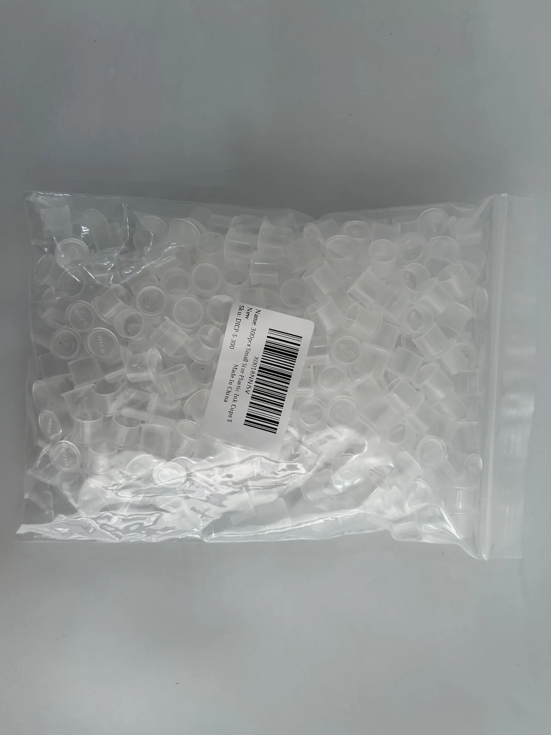 300 szt. Mały rozmiar Plastikowe kubki z tuszem Szerokie białe korki z tuszem Podstawa, 10x11mm S do tuszu do tatuażu, materiały do tatuażu.