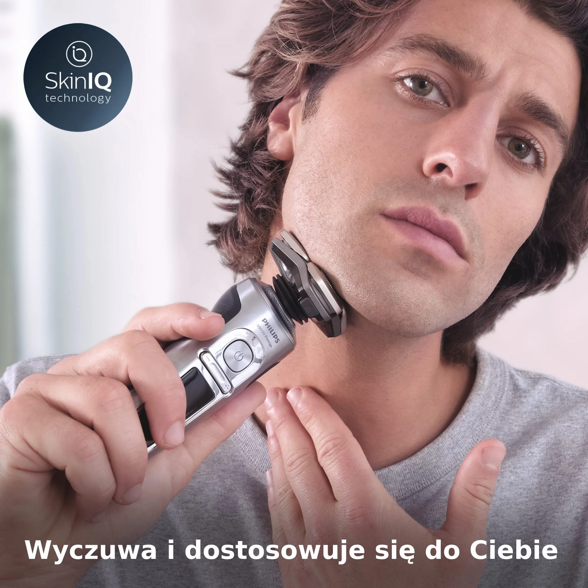 Philips Golarka elektryczna Shaver S9000 Prestige do użytku na mokro i sucho z technologią SkinIQ i saszetką czyszczącą (model SP9871/22)
