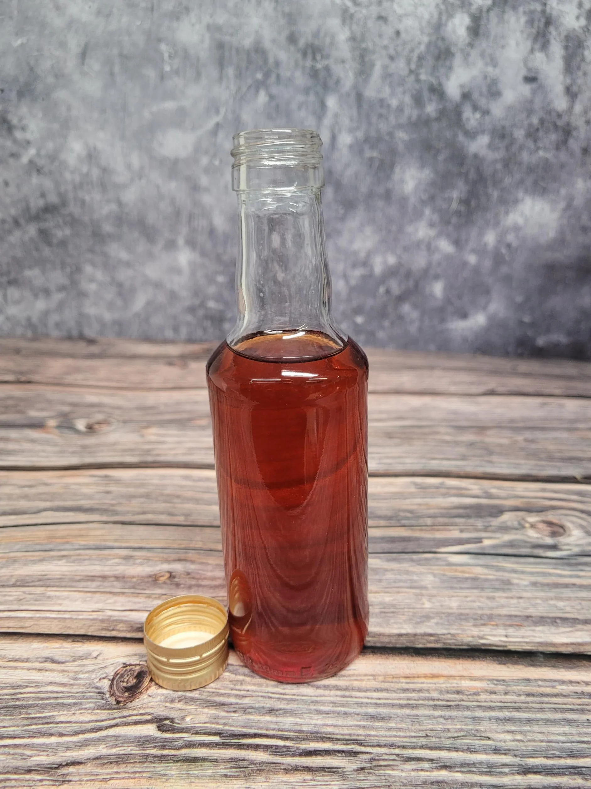 Szklane butelki 200 ml ze złotymi zakrętkami – puste butelki spirytusowe 20 cl 4-pak