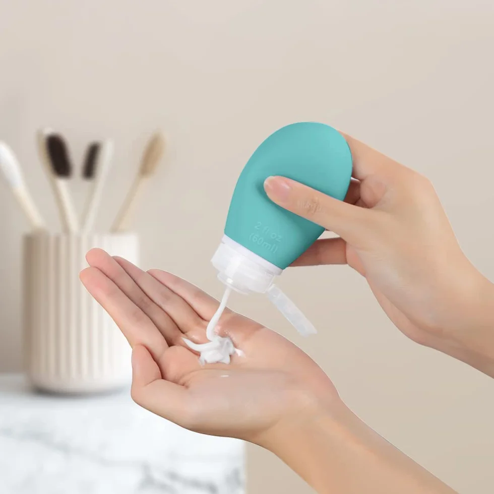 Opret Zestaw 4 silikonowych butelek podróżnych, 60 ml, szczelne, do wielokrotnego napełniania, przenośne pojemniki do szamponu, kremów, odżywki, nie zawierają BPA i posiadają certyfikat TSA