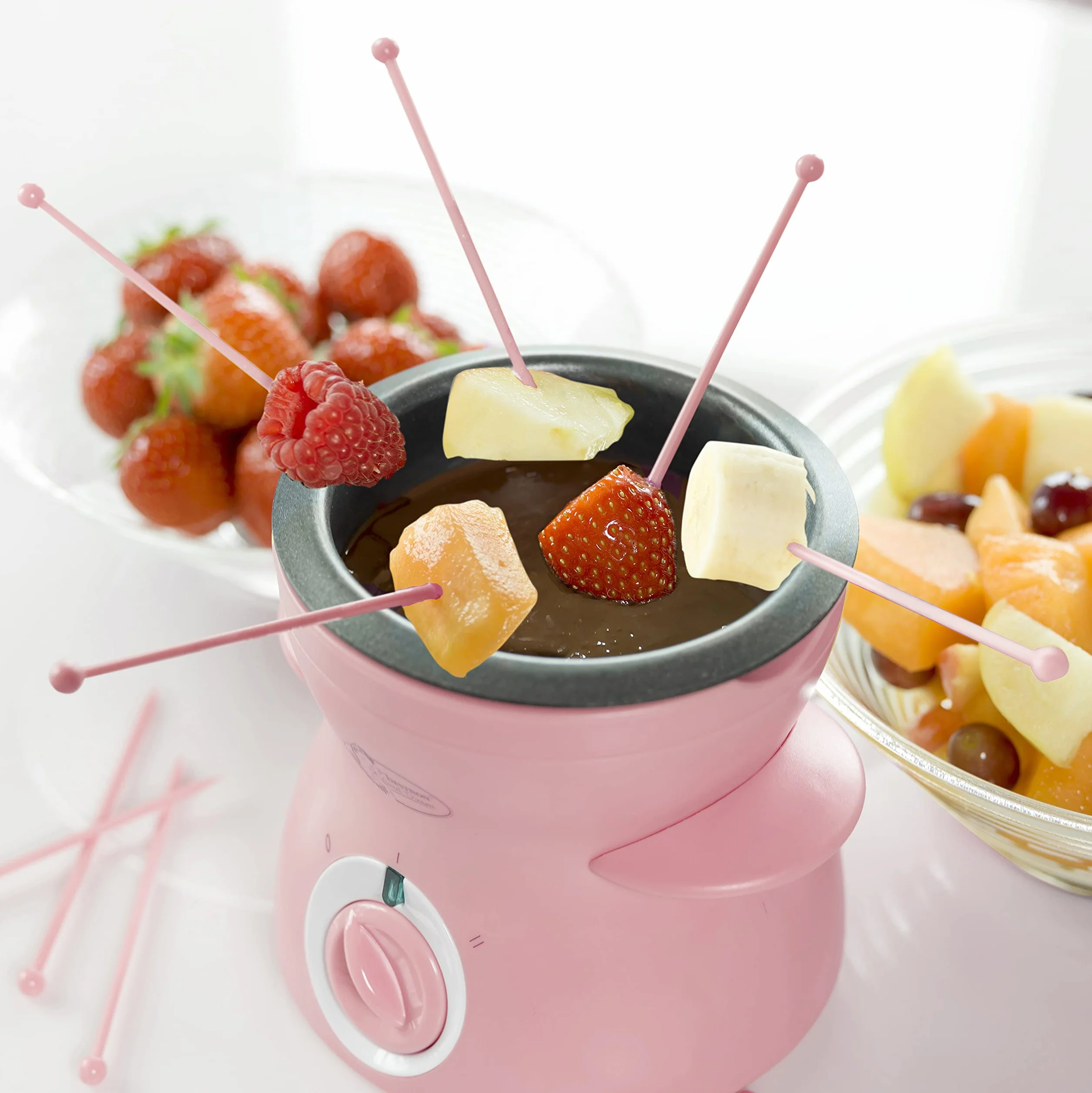 Bestron Czekoladowe fondue dla 2 osób, mini zestaw do fondue czekoladowego, w zestawie: 10 szpikulców, 10 widelców i 1 x szpachelka, 25 W, kolor: różowy