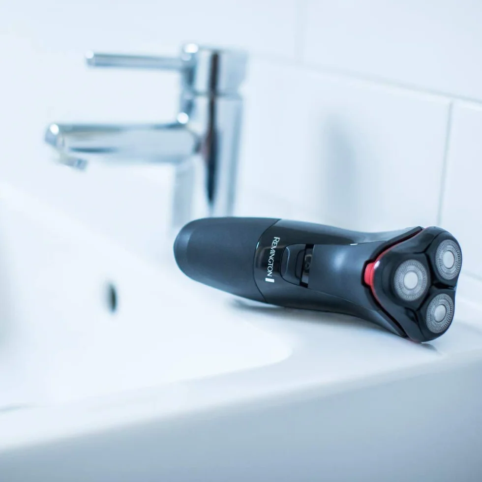 Remington golarka męska, elektryczna, rotacyjna, podwójne pierścienie tnące, ostrza ze stali szlachetnej, trymer precyzyjny Power Series PR1330