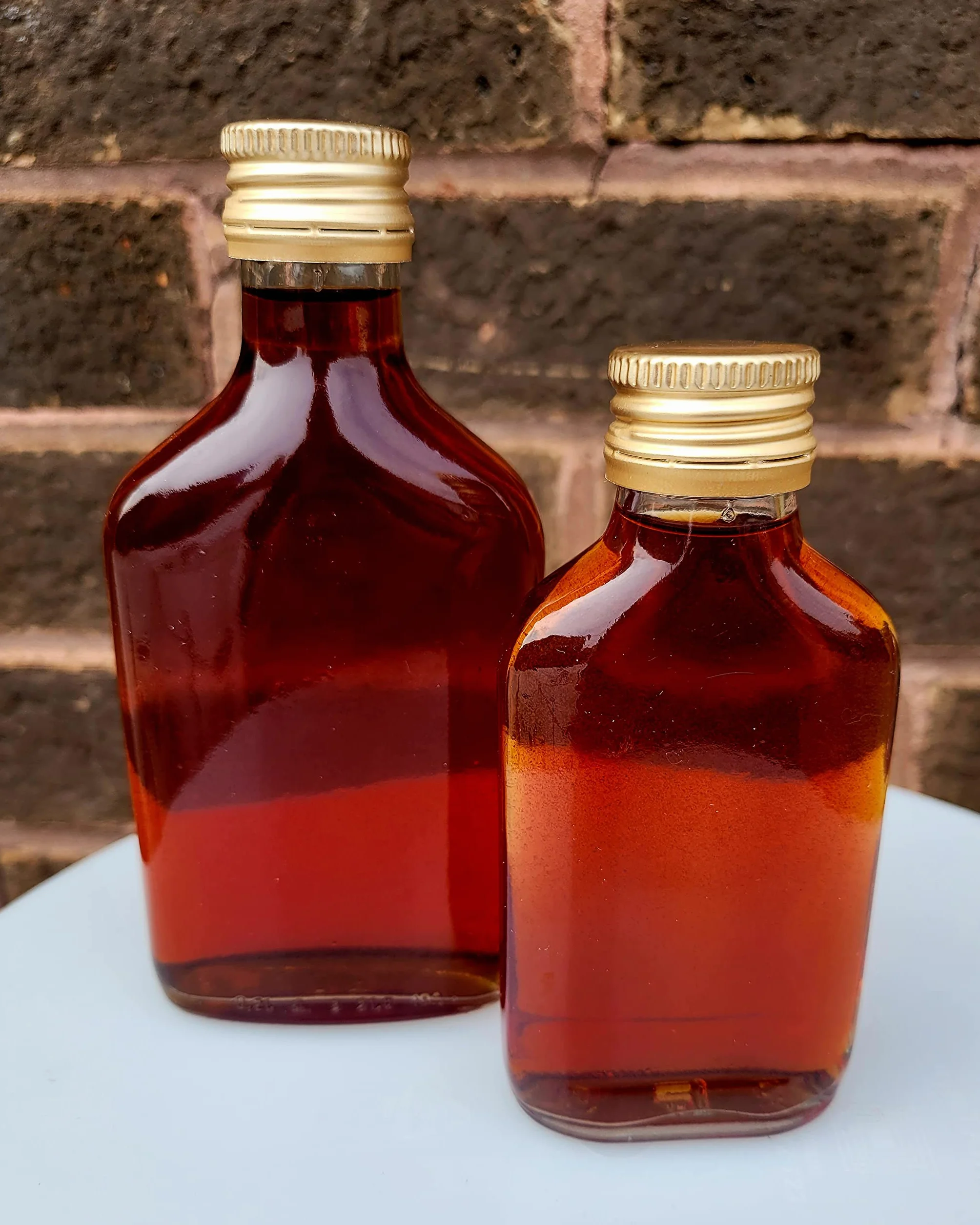 Szklane butelki 200 ml przezroczyste z metalowymi zakrętkami hermetyczne puste do domowego warzenia alkoholi