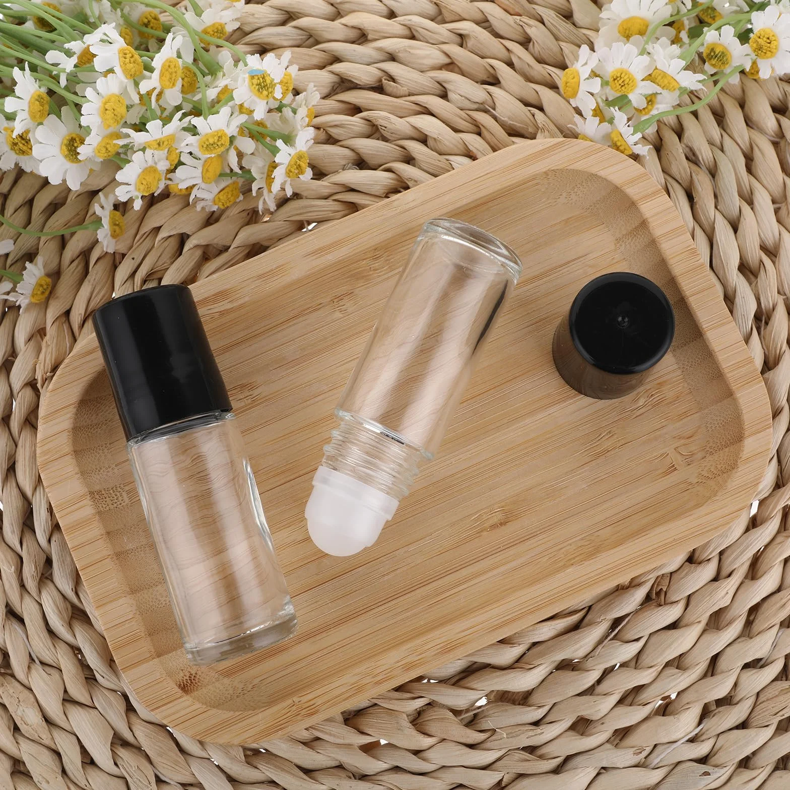 Grevosea 2 x czarne przezroczyste szklane butelki z rolką z tworzywa sztucznego i czarną pokrywką, puste szklane butelki na olejki eteryczne, 30 ml, do wielokrotnego napełniania, kosmetyczne, perfumy